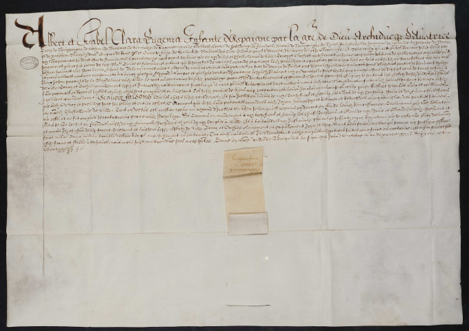 Lettres-patentes des archiducs réformant la décision qui avait induement attribué à Jean Hovine, procureur fiscal de Valenciennes, des biens sis à Lannoy, Lompret et Berchem bénéficiant de la non-confiscation (7 octobre 1614).